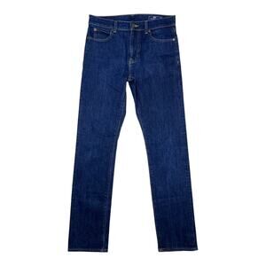 Has a little wear on the back left leg, no hole, just wear